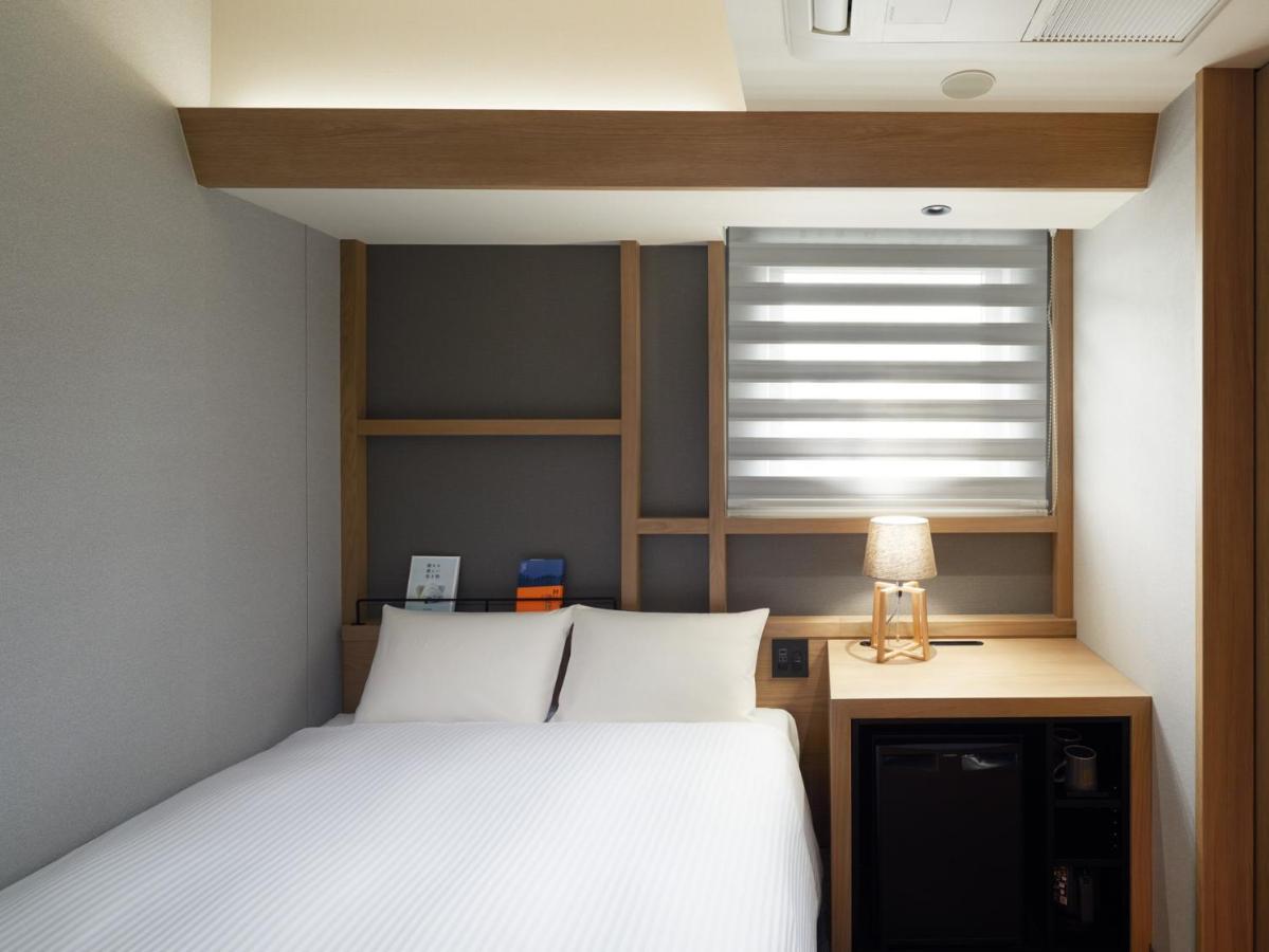 Lamp Light Books Hotel Sapporo Buitenkant foto