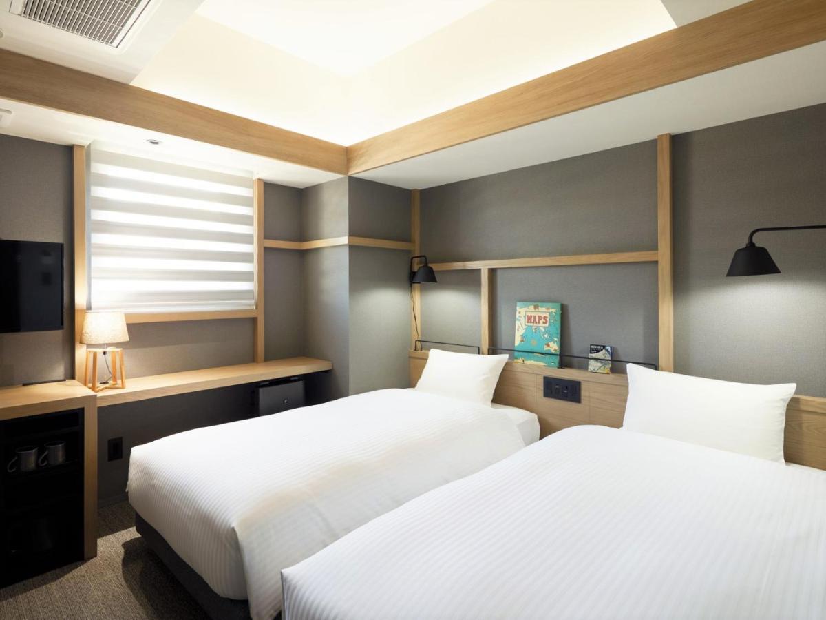 Lamp Light Books Hotel Sapporo Buitenkant foto