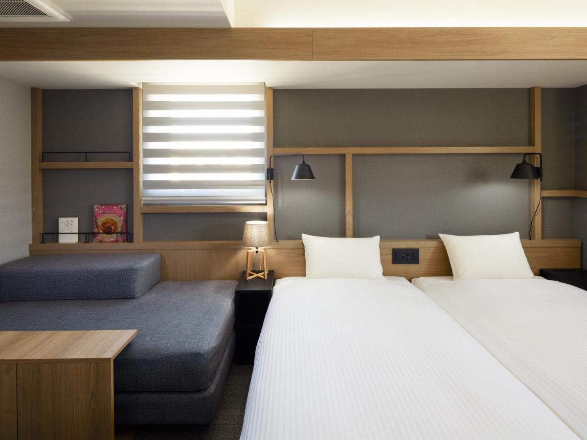 Lamp Light Books Hotel Sapporo Buitenkant foto